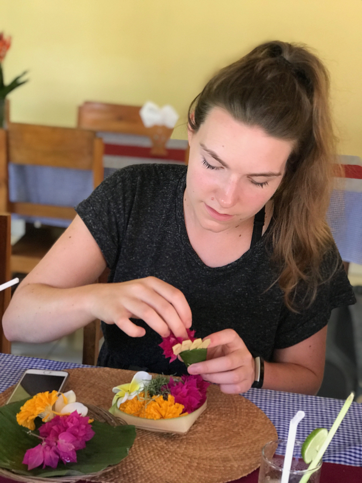 Woman concentrating while preparing food.