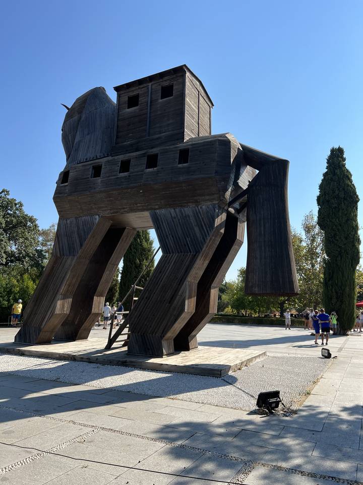 Large wooden horse structure, reminiscent of the Trojan Horse.