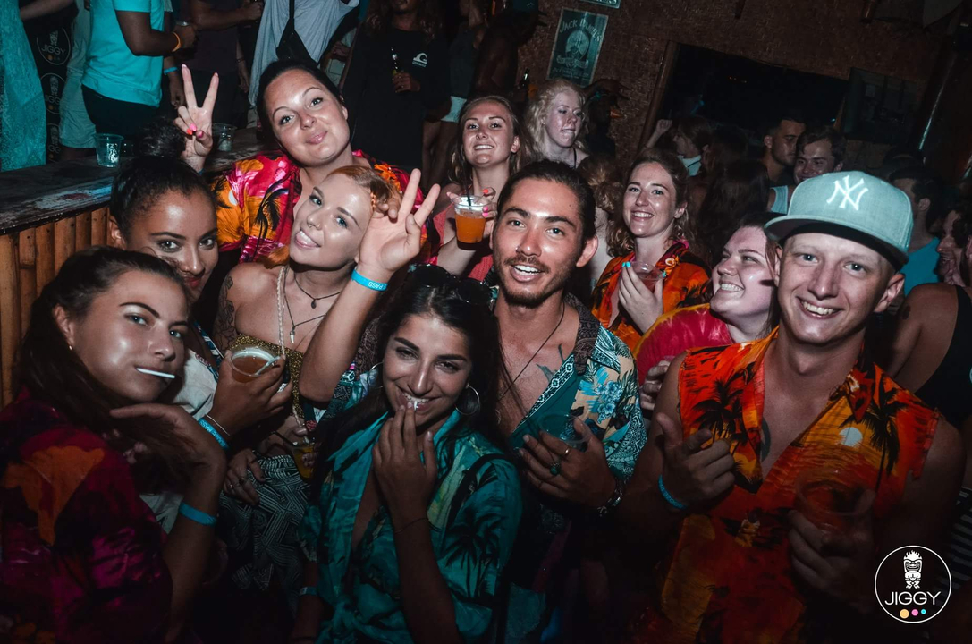 Group of friends having fun at a lively indoor party