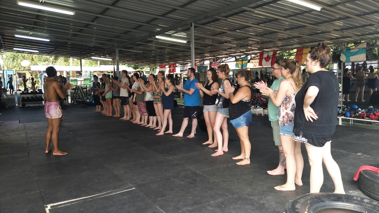 People in a martial arts training session.