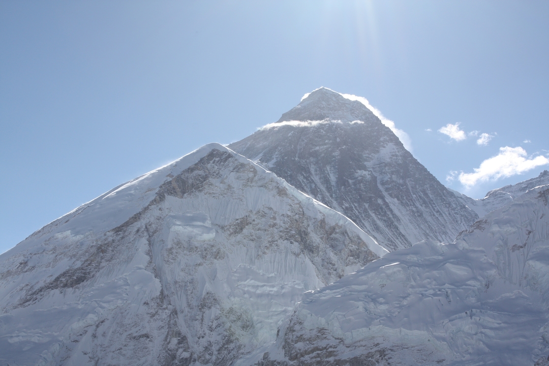 Snow-covered peaks with clear skies.