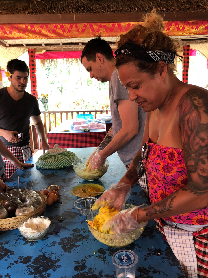 People participating in a cooking class.