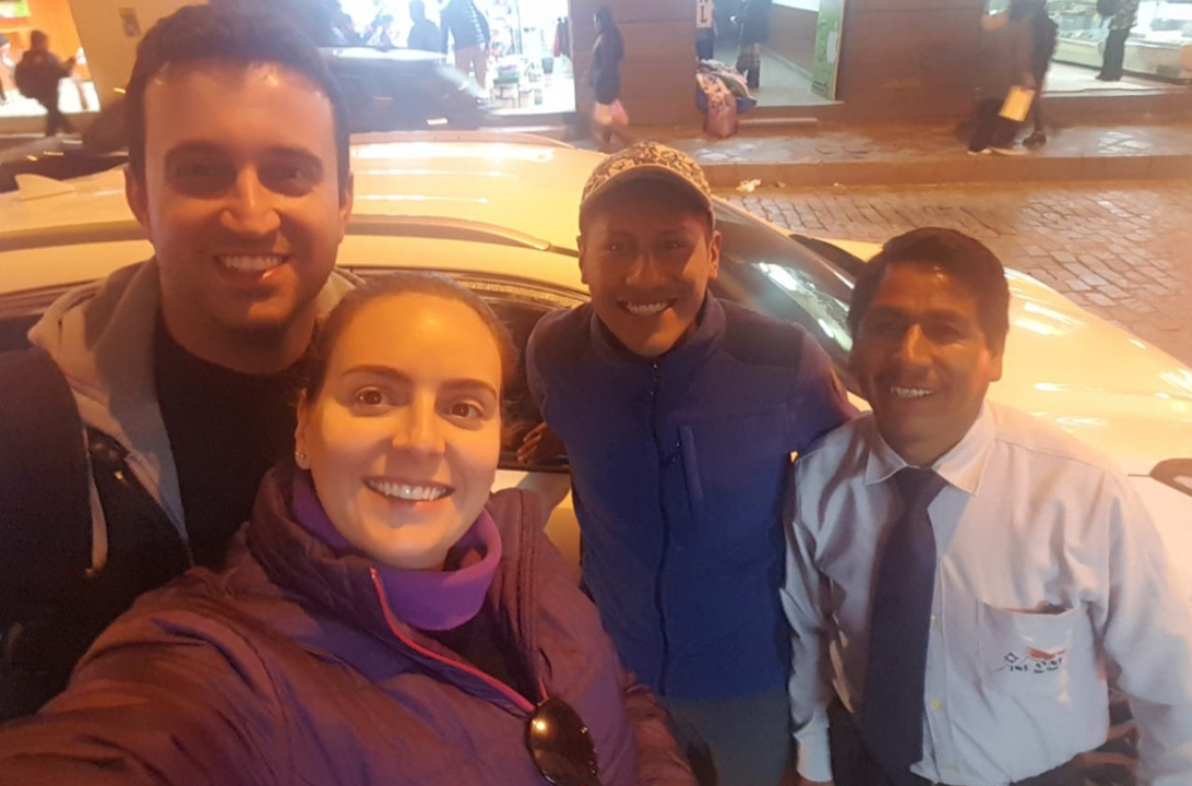 Group of people smiling at night