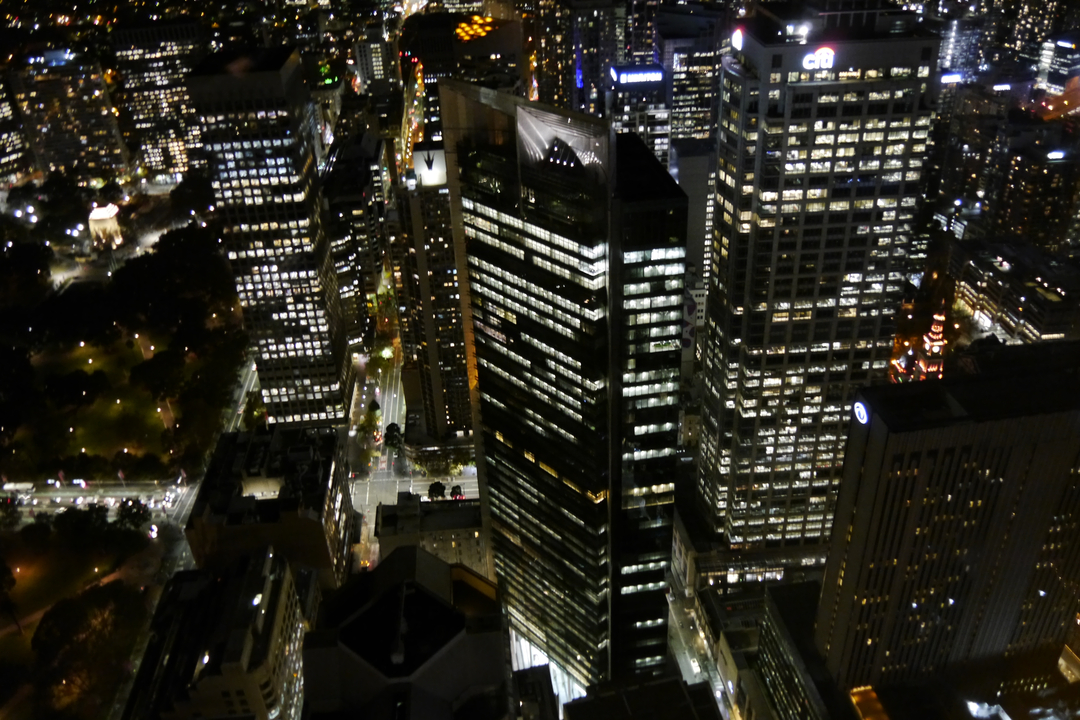 Aerial view of a city skyline at night.