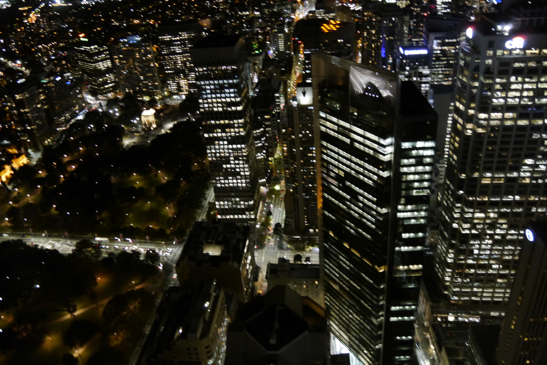 Blurry aerial view of a cityscape at night.