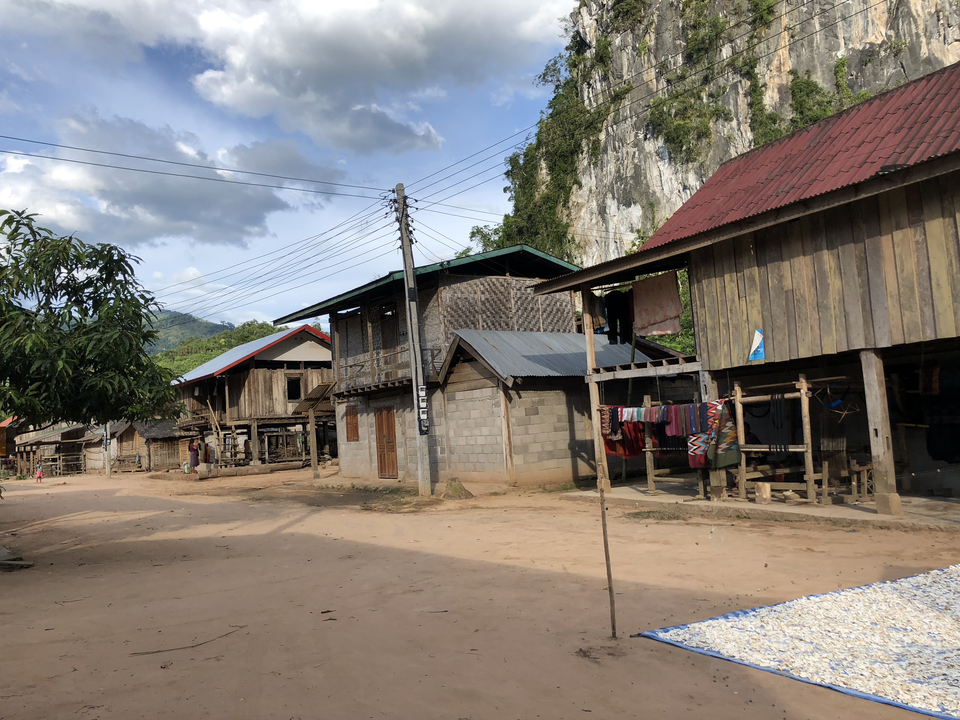 Village with traditional wooden houses.