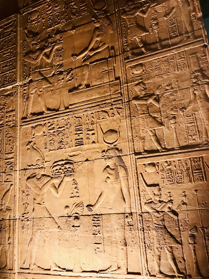 Ancient wall carvings with hieroglyphs.