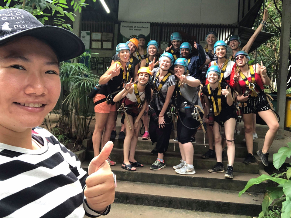 Group of people in adventure gear posing for a photo.
