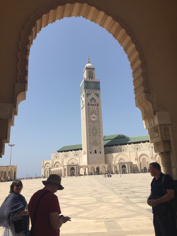 Hassan II Mosque in Casablanca seen through arches.