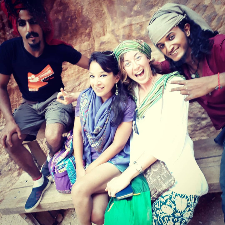 Group of happy friends posing together.