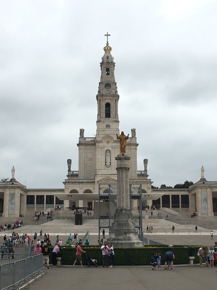Iconic religious building with a statue at the front.