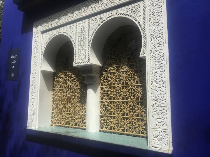 Intricately decorated window and wall.