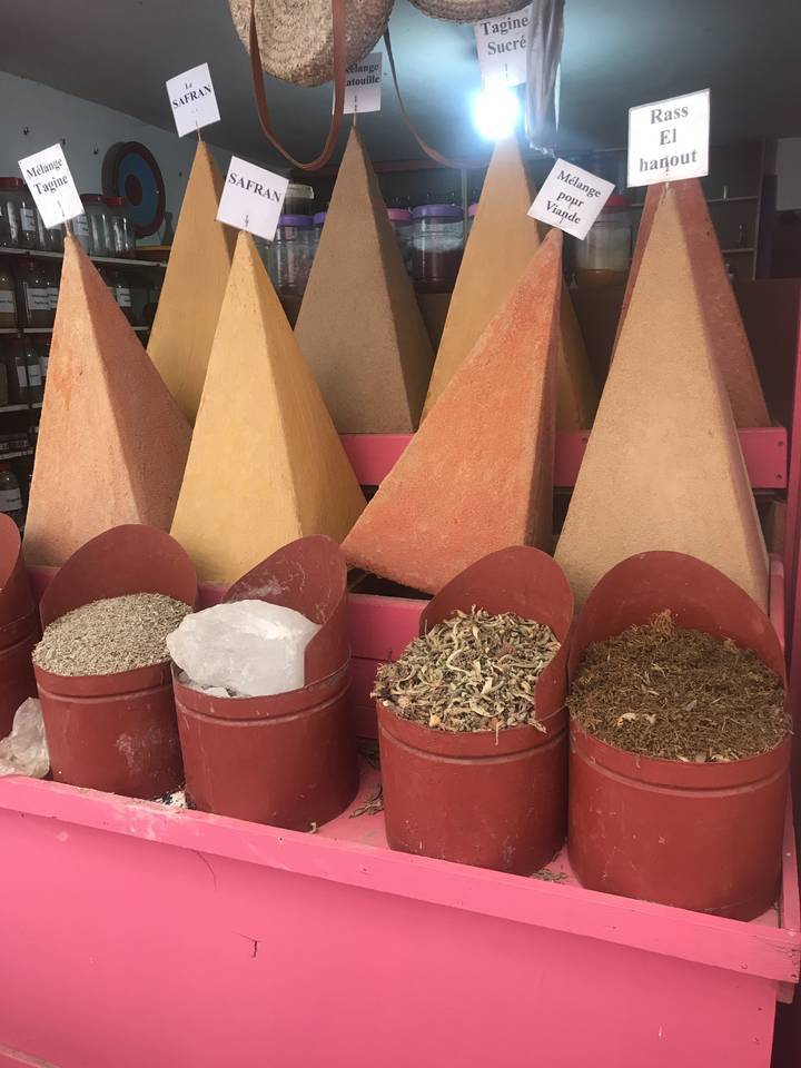 Pyramidal heaps of spices and herbs in a market.