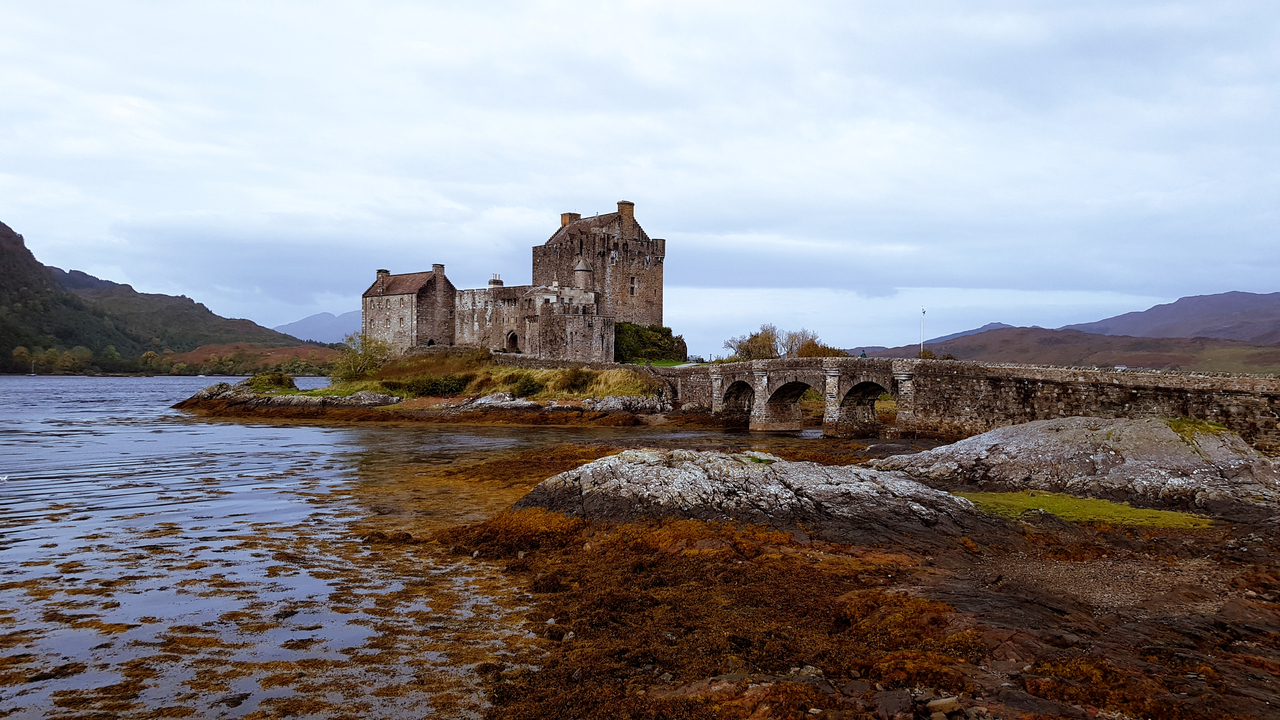 Historic Eilean Donan Castle on a loch.