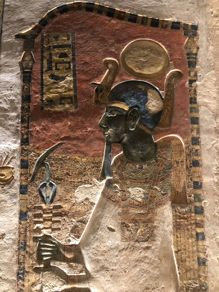 Ancient Egyptian wall art with a profile of a figure.