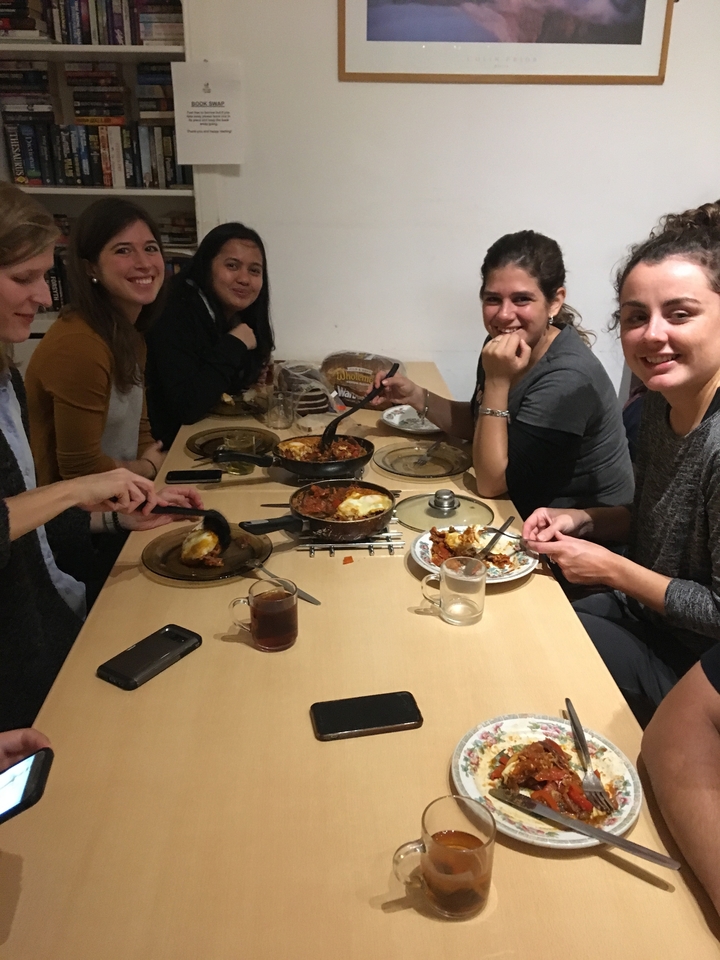 People dining together inside a room.
