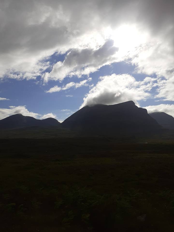 Misty mountain view with dramatic lighting.