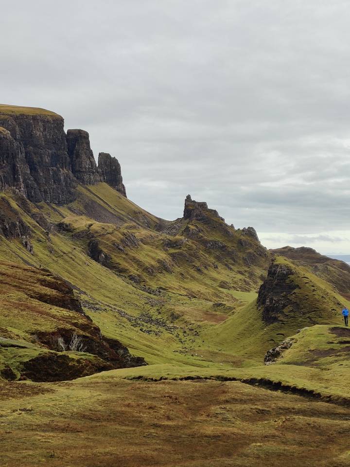 Hilly landscape with grassy slopes.