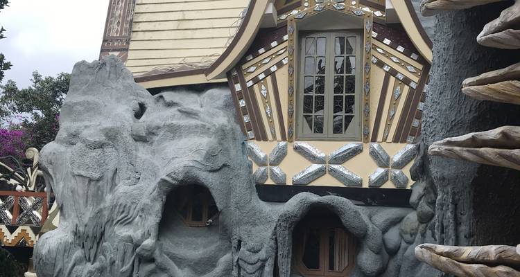 Unique architectural building with tourists.