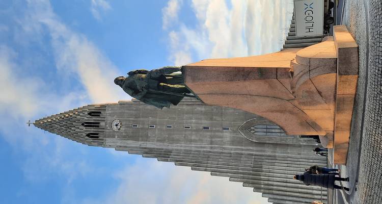 Monument and church in an urban area.