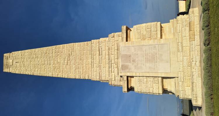 A memorial monument with engraved text, likely in Gallipoli.