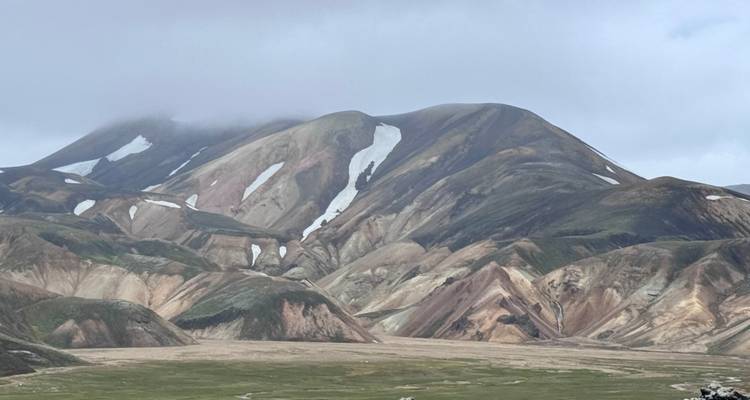 Breathtaking view of mountains with colorful geological formations.