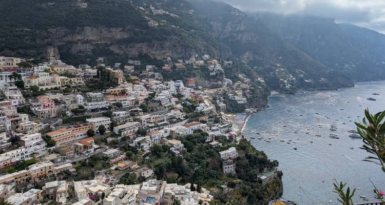 Aerial view of a coastal town with dense buildings