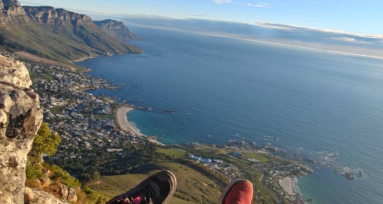 View from a mountaintop down to a coastal city.