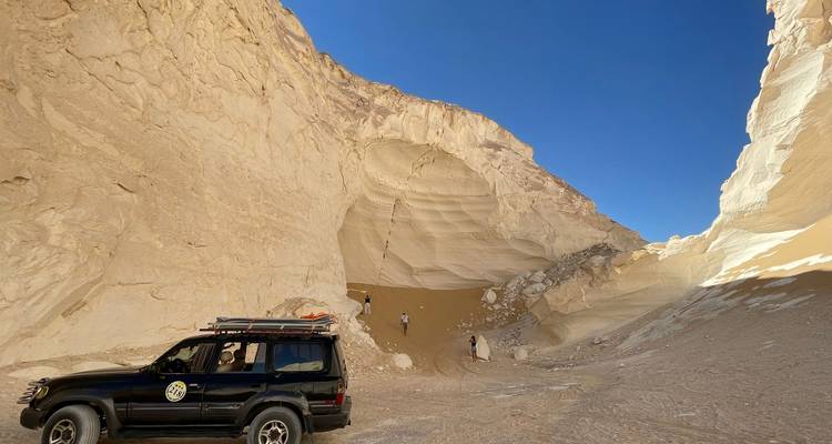 Rocky desert pass with an off-road vehicle.