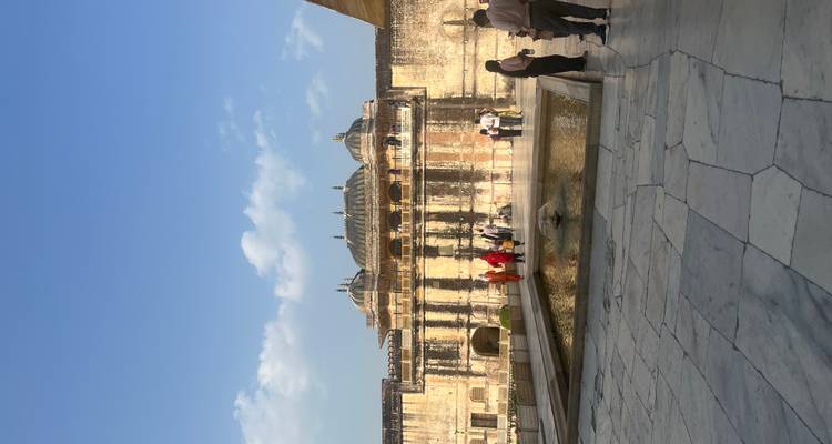 Ancient building with a courtyard and pool.