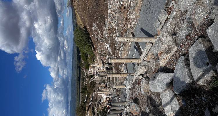 Historical ruins with a path through columns.