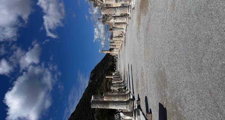Ancient street lined with classical columns.