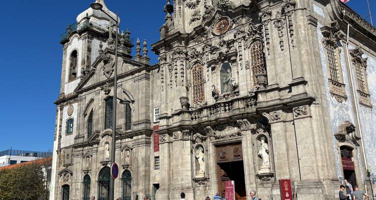 Close-up of a historic church facade with intricate carvings in Porto.