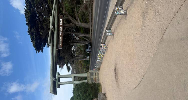 Iconic Great Ocean Road entrance with surrounding greenery.