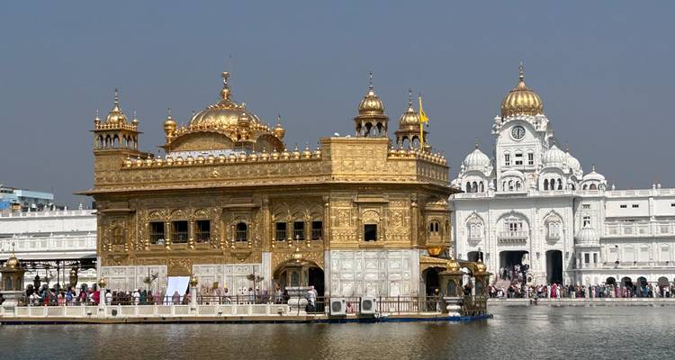 Close-up view of the Golden Temple and surrounding buildings.
