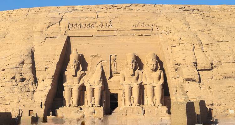 A wide view of the Great Temple of Abu Simbel carved into the rock.