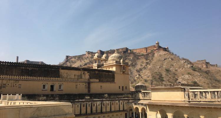 A grand fort in a mountainous landscape.