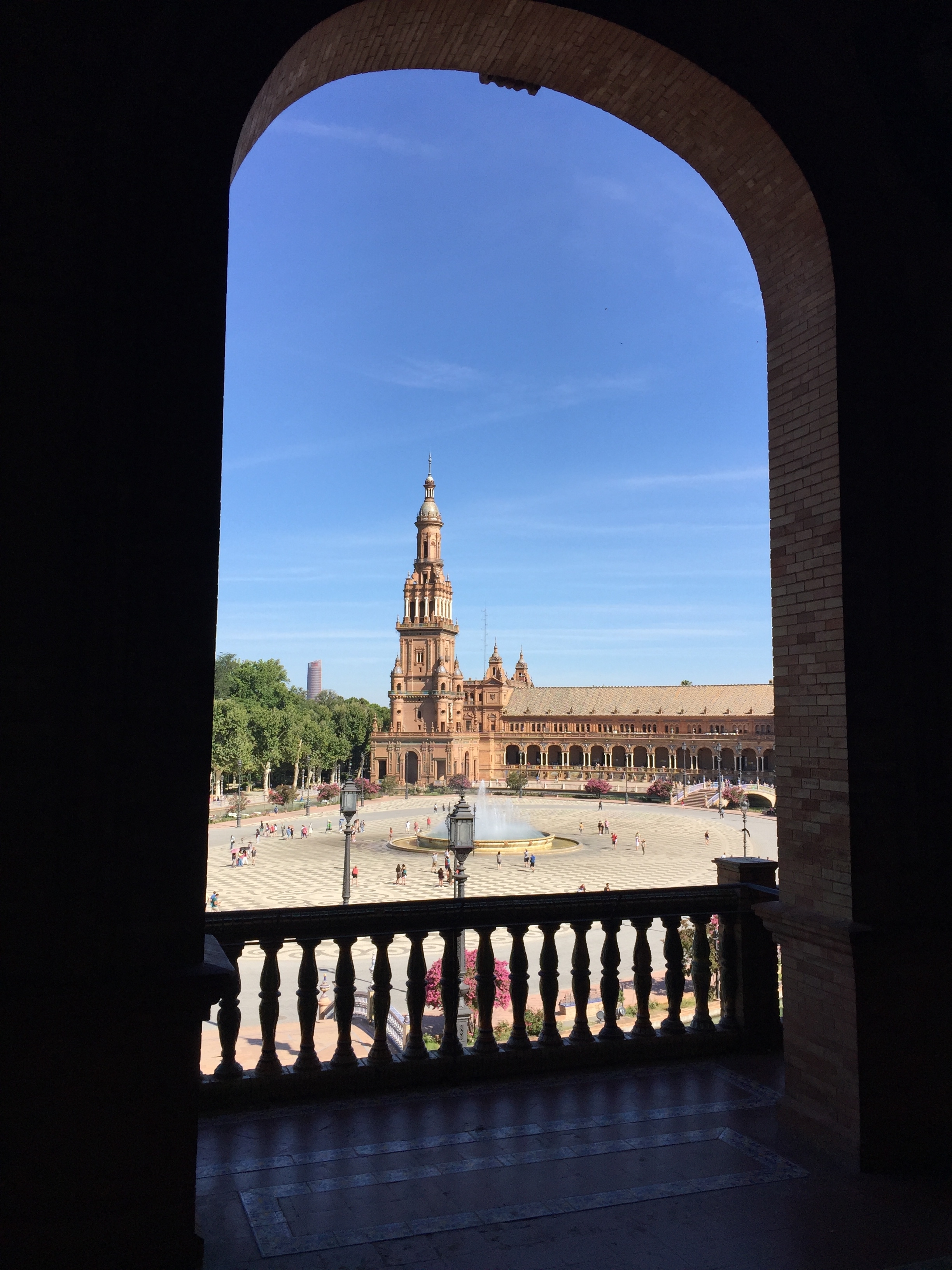 Plaza de España with its distinctive architecture in the background.