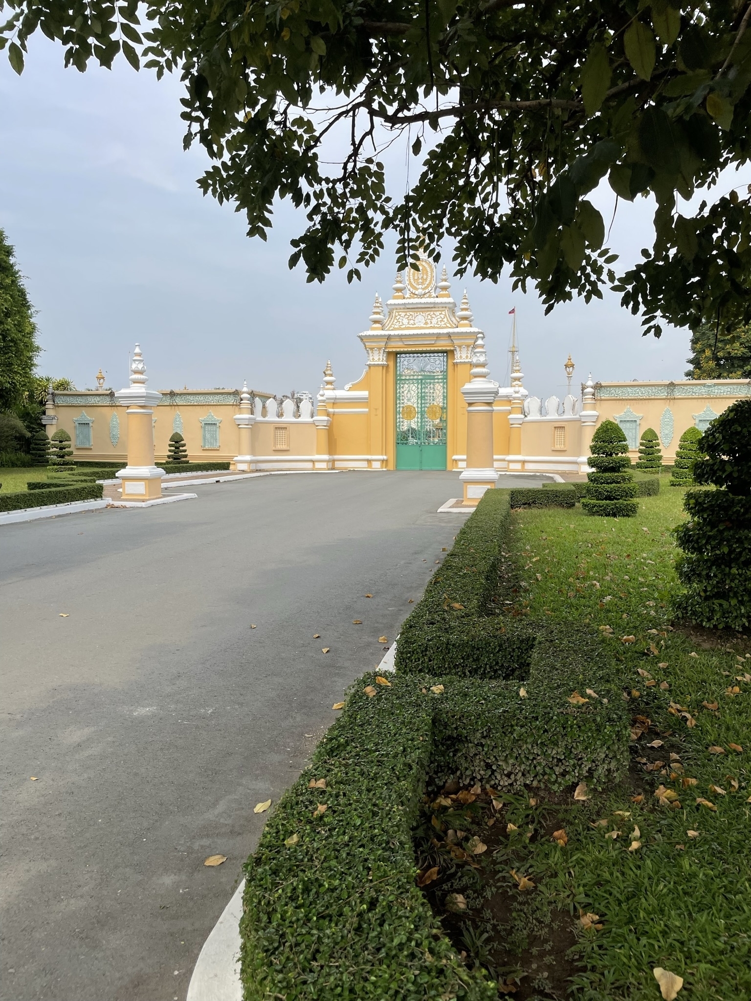 A grand entrance gate in an ornate style with decorative elements.