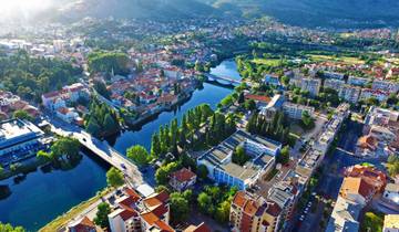 Discover the beauty of Bosnia in a 4 days all seasons tour from Dubrovnik. Visit Ottoman fortresses, ancient Orthodox monasteries, old walled towns, Kravica Waterfall and Vjetrenica Cave. UNESCO sites. Nature. Architecture. Culture. Cuisine. Wine. Tour