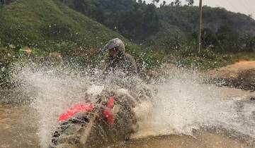 Scenic Laos Motorcycle Tour from Luang Prabang to Vang Vieng via Caves and Waterfalls Tour