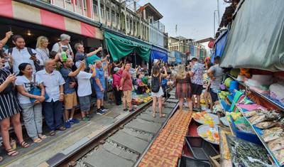 Small Group: Damnoen Floating market & Train market — 2