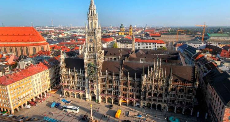 Aerial view of Munich’s Marienplatz with the ornate Neues Rathaus clock tower dominating the cityscape.