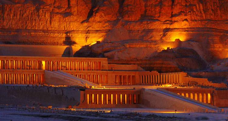 The illuminated Temple of Hatshepsut at night.