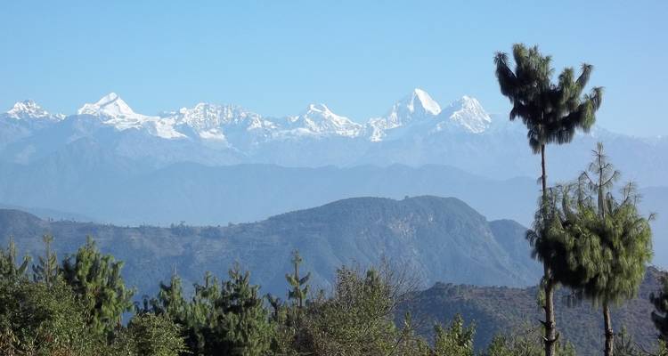 Himalayan mountain range with clear blue skies.