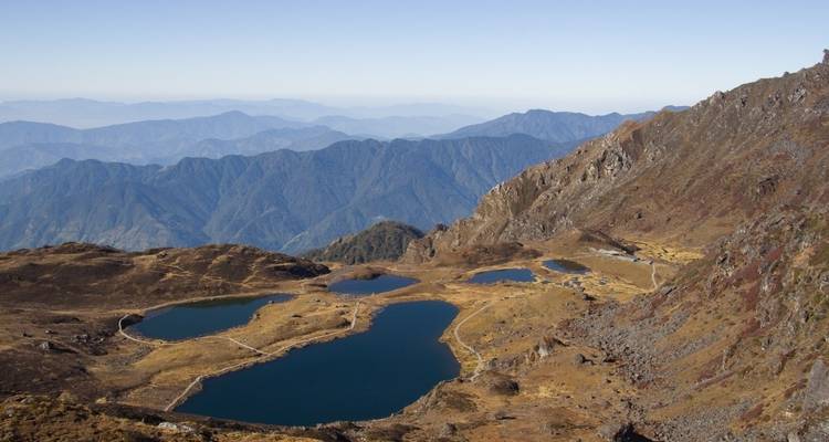 High-altitude lakes with mountains in the background.