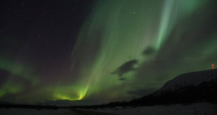 Aurora borealis lighting up the night sky.