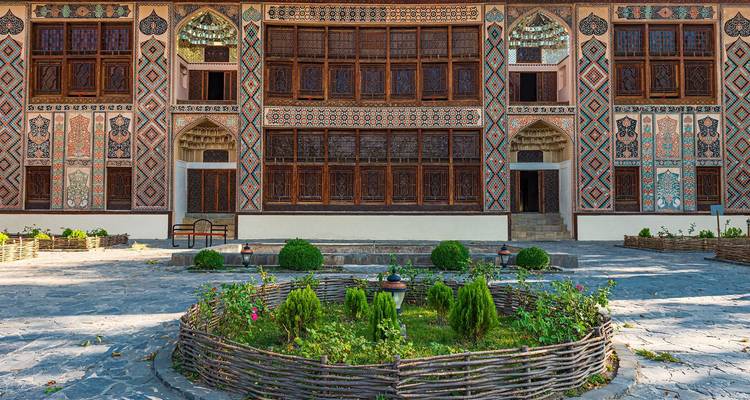 Facade of a historic building with detailed decor.