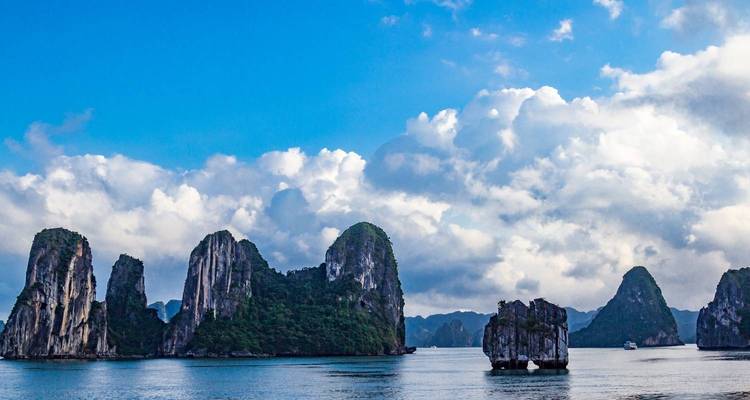 Stunning seascape with towering limestone islands in Halong Bay.
