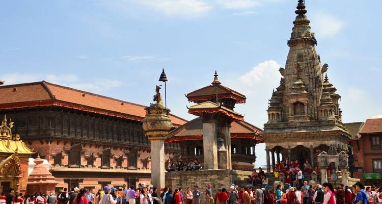 A busy square with traditional architecture in Kathmandu, Nepal.